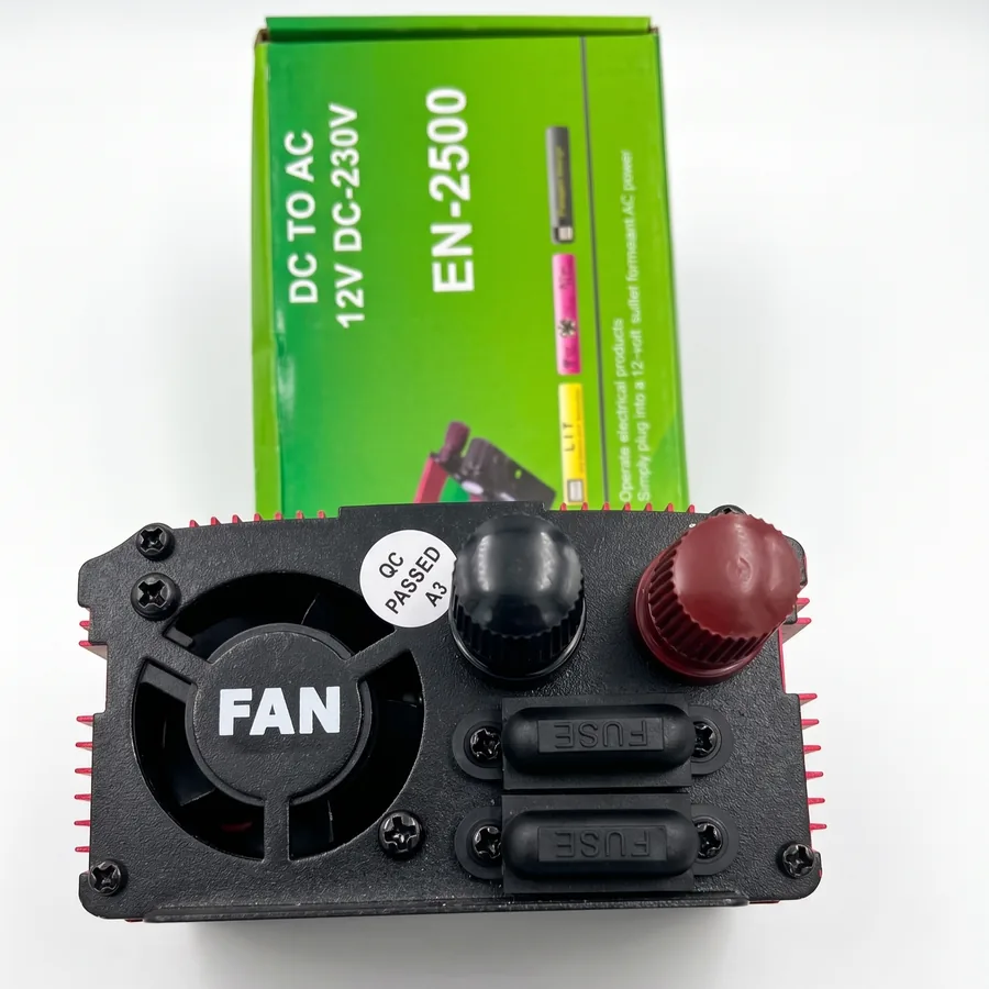The other end holds the cooling fan, two replaceable fuses and the positive and negative battery terminals.