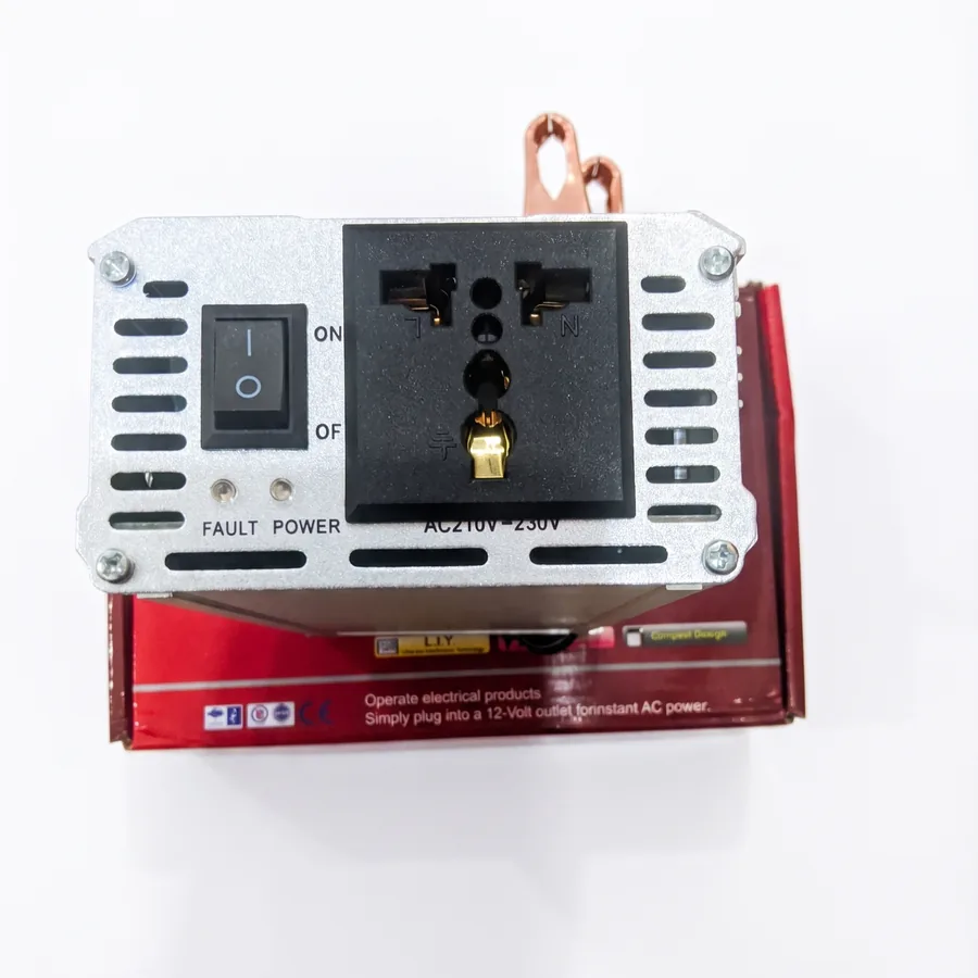 The output side: the ON/OFF switch, the universal 230V socket, and the power and fault indicator lights.