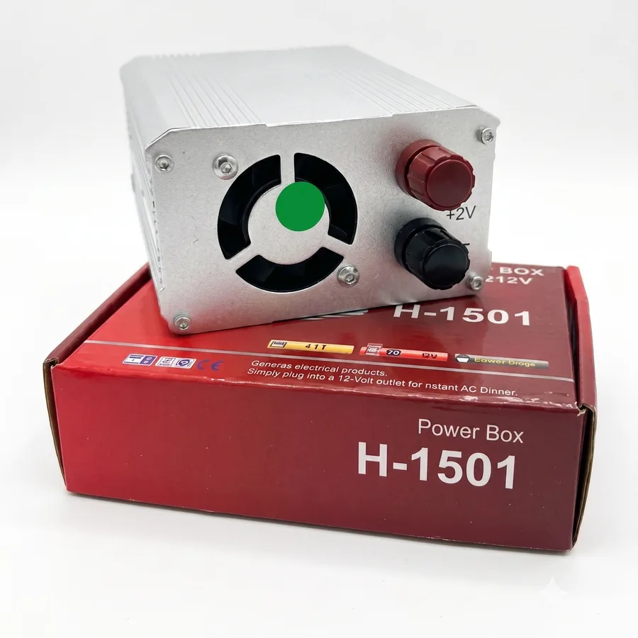 The cooling fan at one end, next to the red positive and black negative battery terminals.