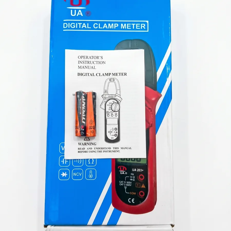 The kit includes the printed instruction manual and two AAA batteries to get you started.