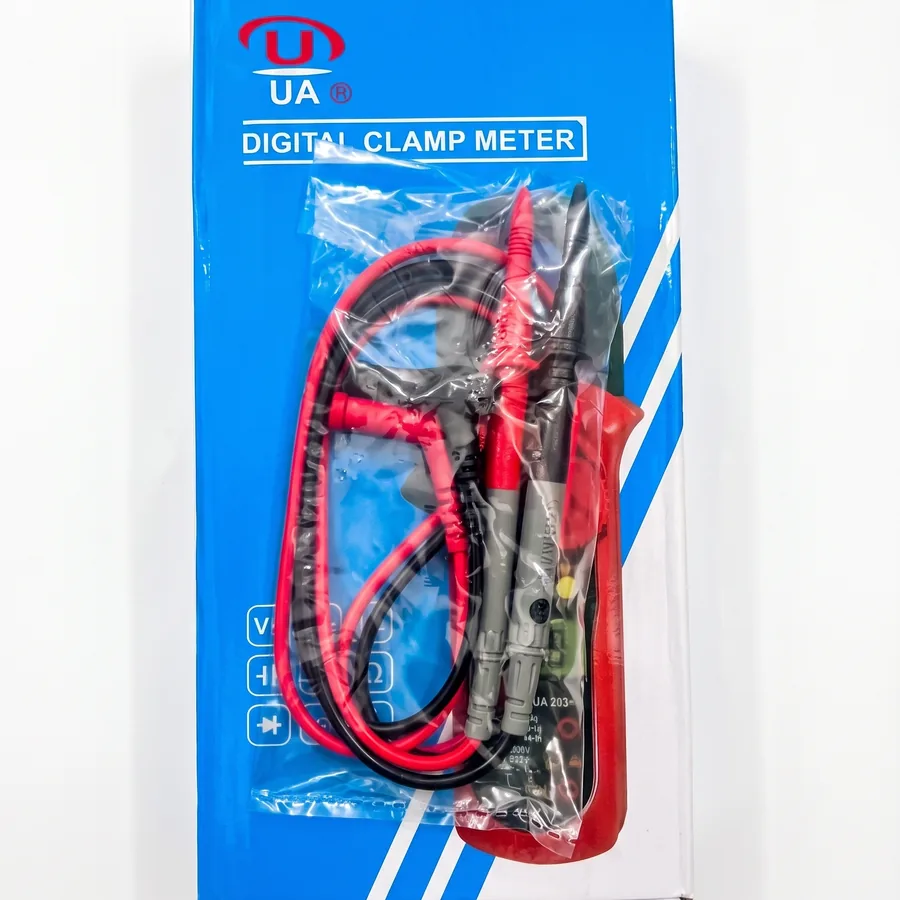 A pair of red and black test leads is included for voltage, resistance and continuity checks.